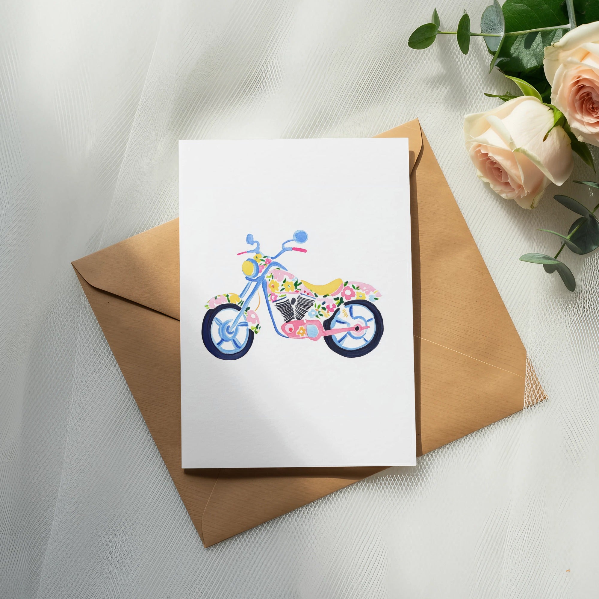 Watercolor motorcycle illustration on a card with roses and eucalyptus.