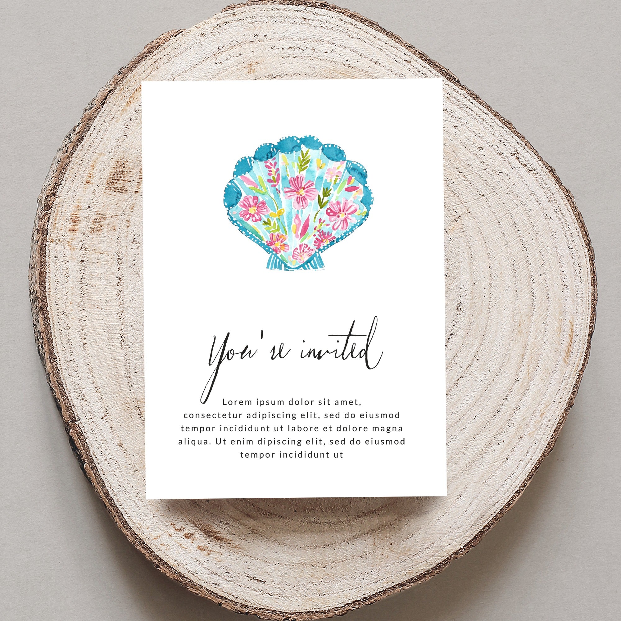 Invitation with seashell illustration and placeholder text.