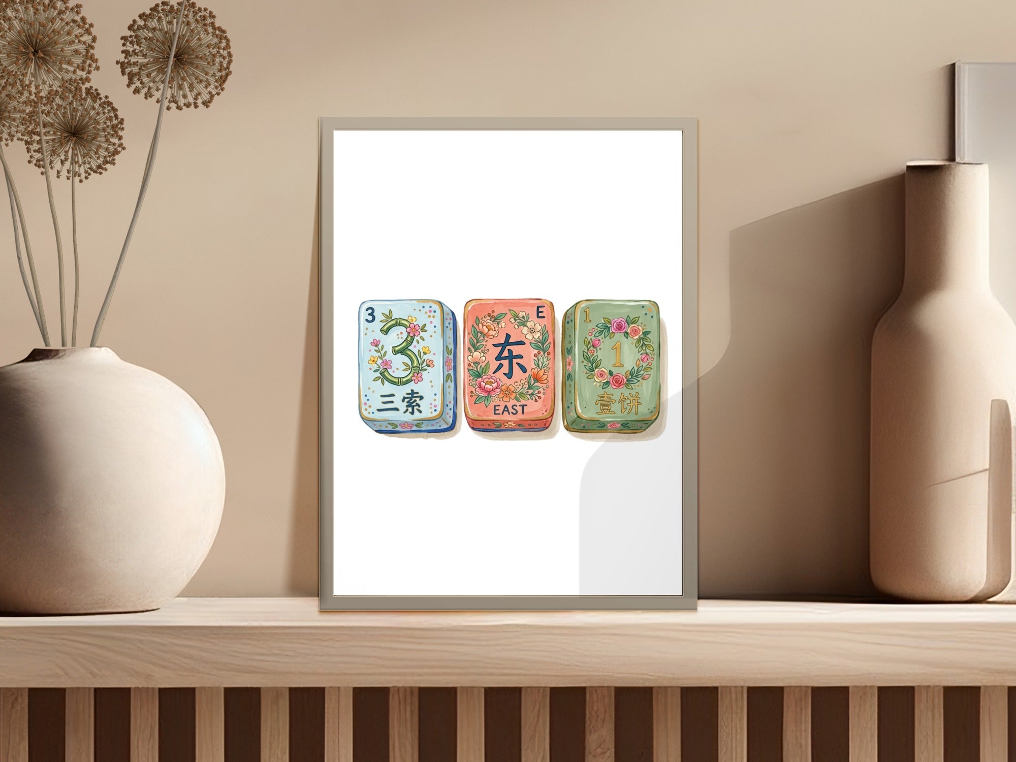 Three framed Mahjong tiles with floral designs and Chinese characters.