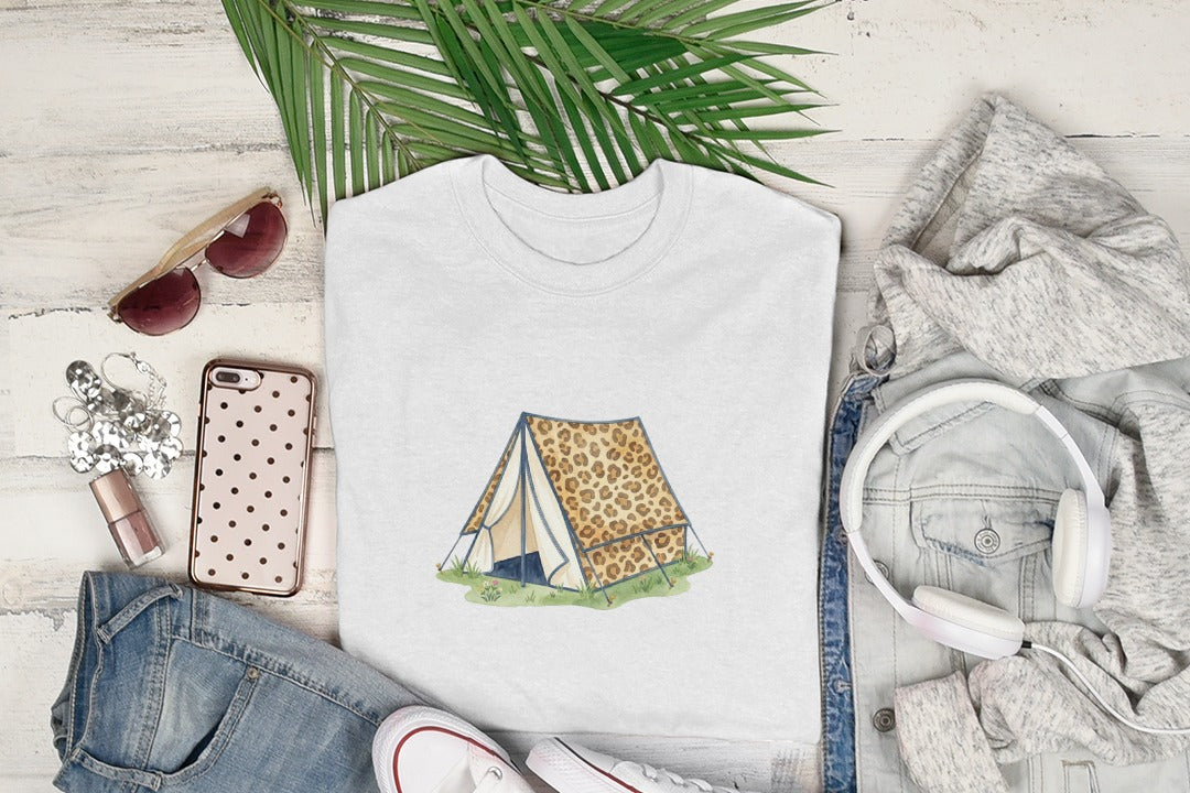 White t-shirt with leopard print tent graphic, laid flat with accessories.