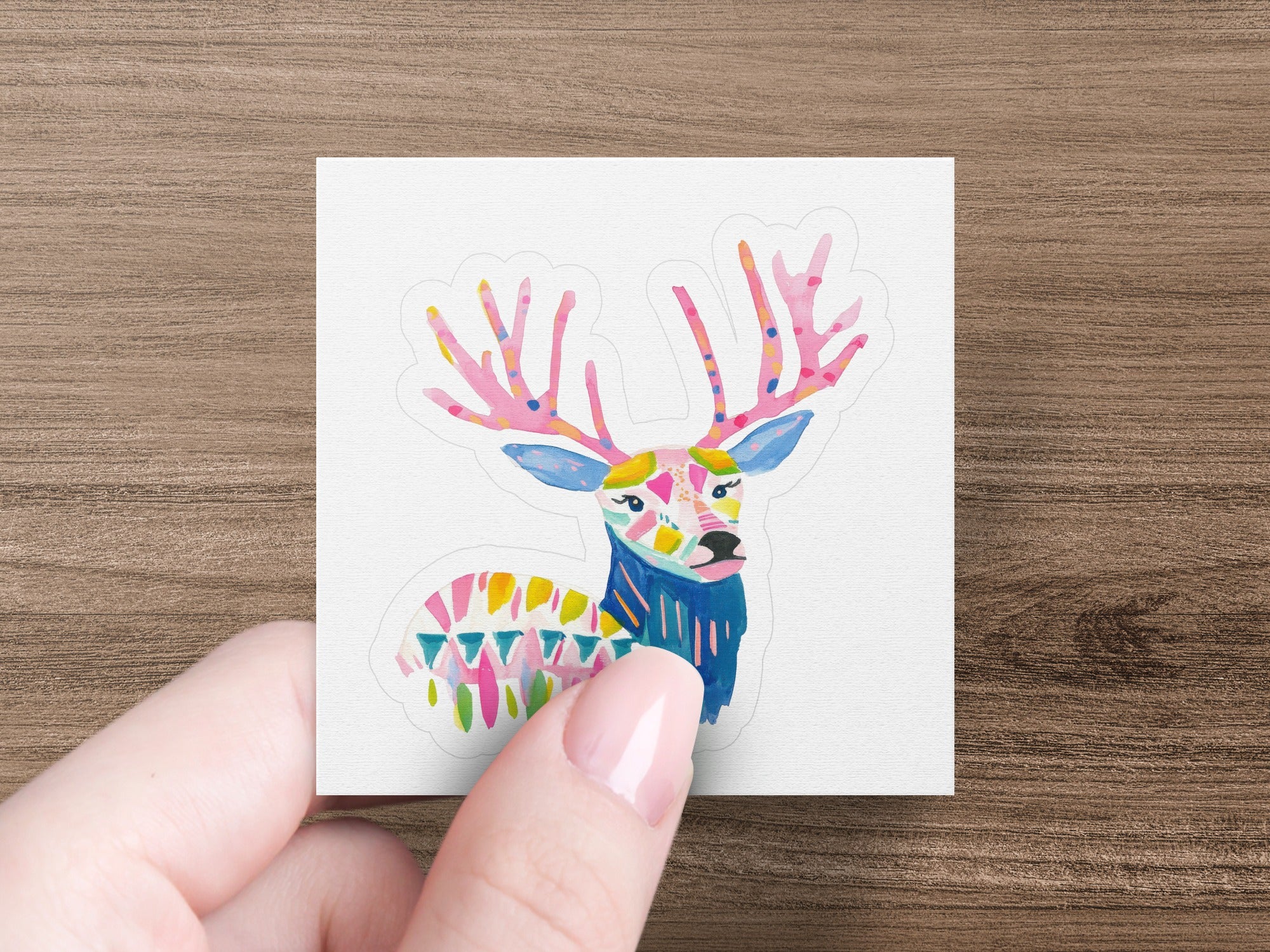 Colorful abstract deer sticker with geometric patterns on antlers and body.