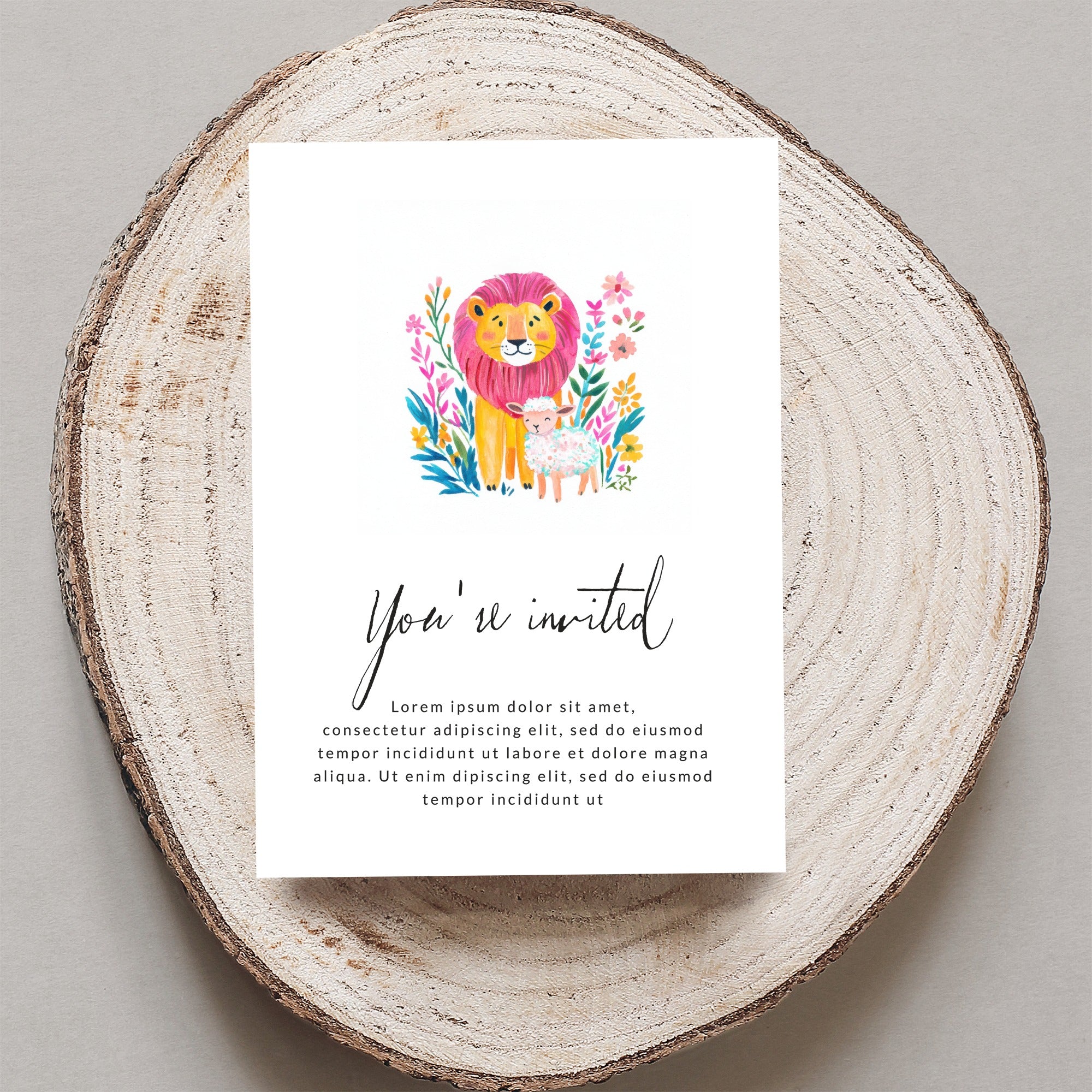Invitation with cartoon lion and lamb, with "You're invited" text.