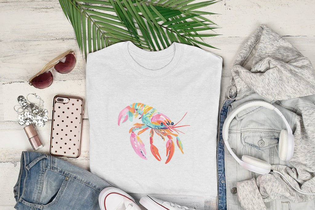 White t-shirt with a colorful watercolor lobster graphic.