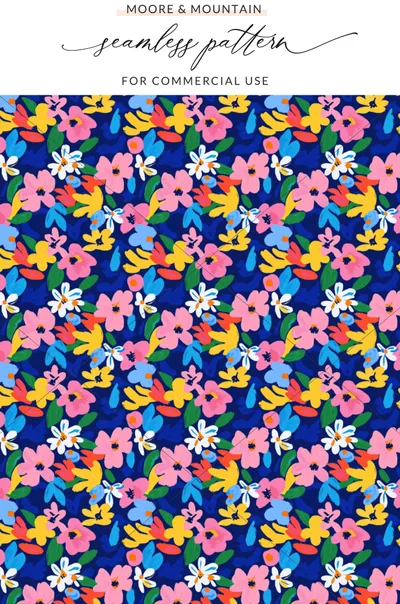 Blue background with scattered colorful abstract flowers and leaves.