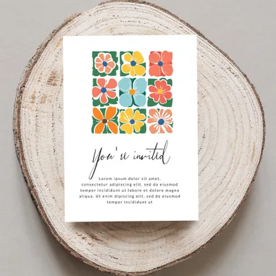 Invitation with floral squares and "You're invited" text.