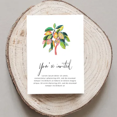 Invitation with watercolor lemon branch and "You're invited" text.