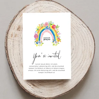 Invitation with rainbow and "answered prayer" text.
