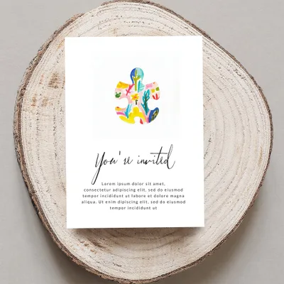 Invitation with colorful puzzle piece design and "You're invited" text.