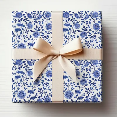 Elegant Blue Floral Gift Wrapping with Bow and Ribbon