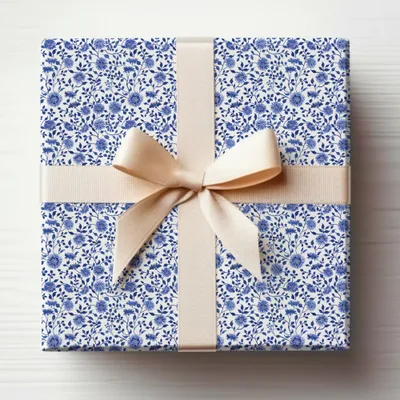 Elegant Blue Floral Gift Wrap with Cream Bow