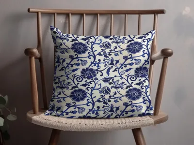 Elegant Blue Floral Design on Decorative Pillow