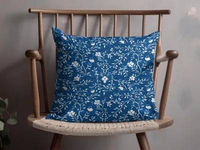 Floral Blue Decorative Pillow With White Flower Design