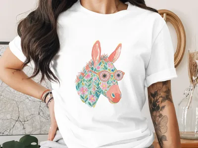 White t-shirt with watercolor donkey head graphic wearing colorful floral glasses.