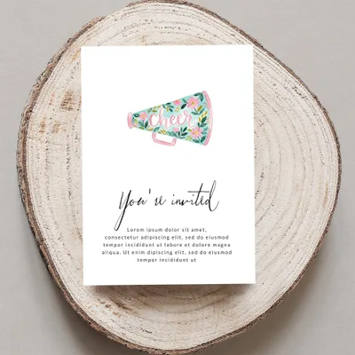 Cheer invitation with floral megaphone and "You're invited" text.