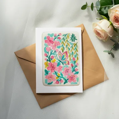 Greeting card with floral and butterfly design, featuring Chinese character "Spring".