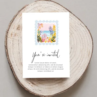 Invitation card with "You're invited" and floral postage stamp design.