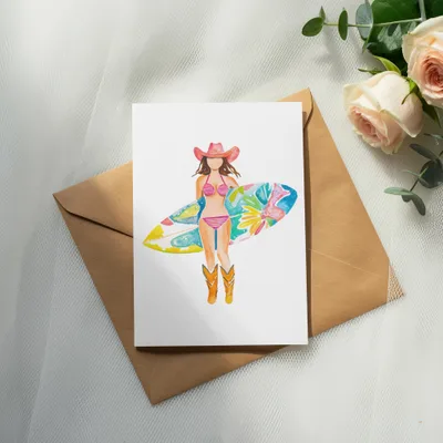Watercolor illustration of a woman in a bikini, cowboy hat, and boots holding a surfboard.