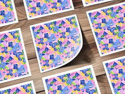 Floral pattern stickers on a wooden background.