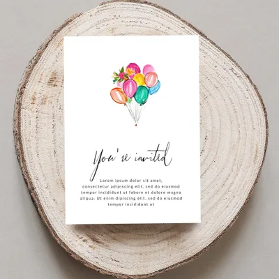 Invitation with colorful balloons and "You're invited" text.