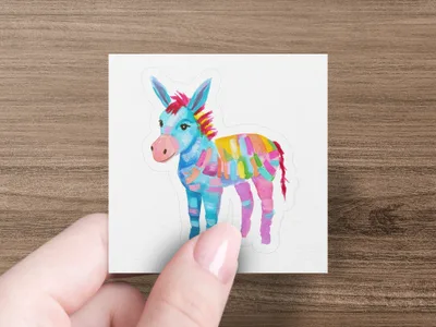 Cartoon donkey sticker with bright pink, blue, and yellow stripes.