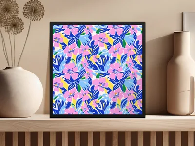 Framed artwork with a vibrant blue, pink, and yellow floral pattern.