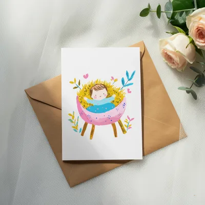 Illustration of baby Jesus in a manger with roses and eucalyptus.