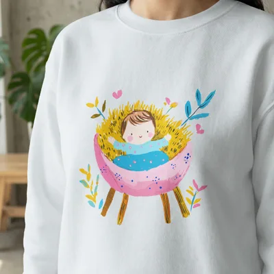 Illustration of a baby in a pink manger surrounded by straw and colorful elements.