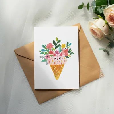 Card with a watercolor painting of a cat face in an ice cream cone.