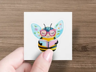 Cartoon bee wearing glasses reads a book.