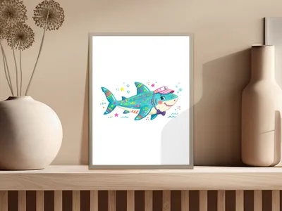 Colorful cartoon shark wearing a cap and bow tie on a shelf.