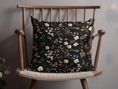 Elegant Black Pillow with Floral Pattern Design