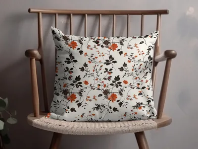 Elegant Floral Patterned Orange and Black Cushion