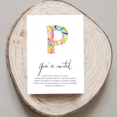Invitation card with colorful floral letter P and placeholder text.