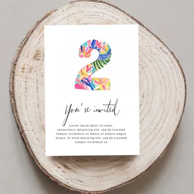 Birthday invitation card with colorful "2" and "You're invited" text.