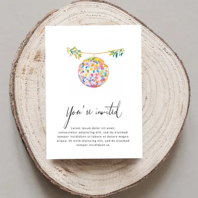 Invitation with watercolor disco ball and handwritten "You're invited" text.
