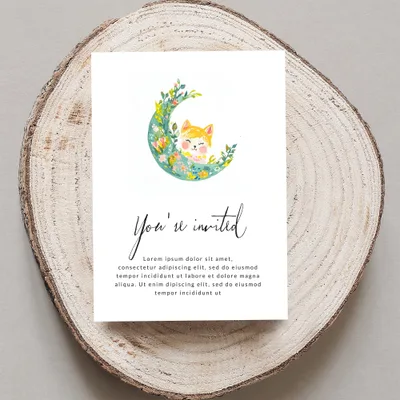 Invitation card with crescent moon, fox, floral wreath, and placeholder text.