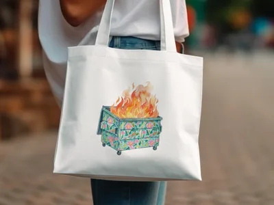 White canvas tote bag with a dumpster fire illustration and floral accents.