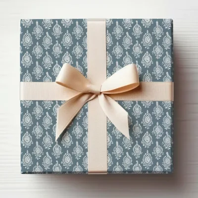 Elegant Blue Patterned Gift Box with Cream Ribbon