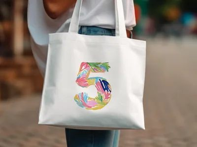 White tote bag with colorful floral number 5 design.