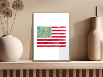 American flag with floral watercolor pattern on a shelf.