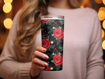 Woman holding tumbler with red floral design and greenery on black background, Floral Arrangement on Black Background Artful Design
