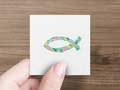 Jesus fish symbol with a floral pattern on a white background.