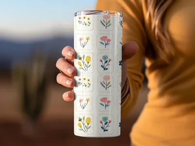 Hand holding tumbler with floral pattern featuring watercolor flowers from Floral Digital Paper, Seamless Flower Pattern, Watercolor Flower Clipart, Flower Design for Fabric, Flower Digital Backgrounds