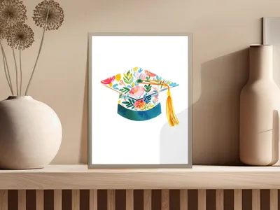 Watercolor graduation cap with floral design and yellow tassel.