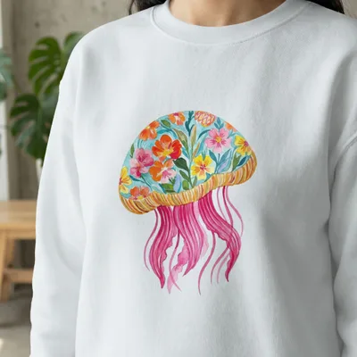 White sweatshirt with colorful floral jellyfish graphic on front.