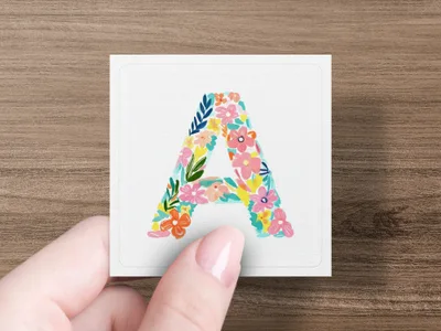 Letter A decorated with colorful floral pattern.