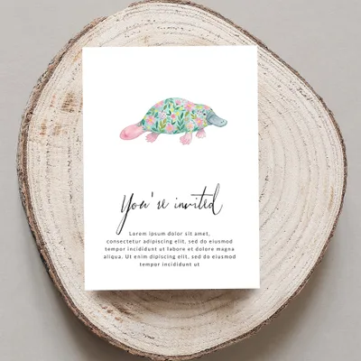 Invitation card with a platypus illustration, reads "You're invited" and placeholder text.