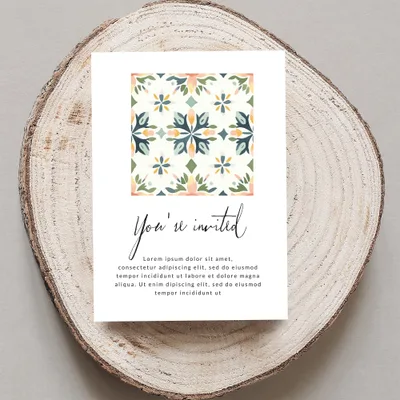 Invitation with colorful geometric pattern and "You're invited" text.