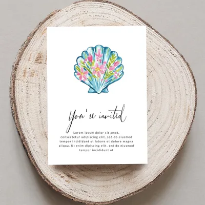 Invitation card with watercolor seashell illustration and "You're invited" text.
