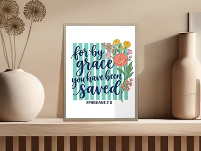 Framed print with "for by grace you have been saved" and Ephesians 2:8.